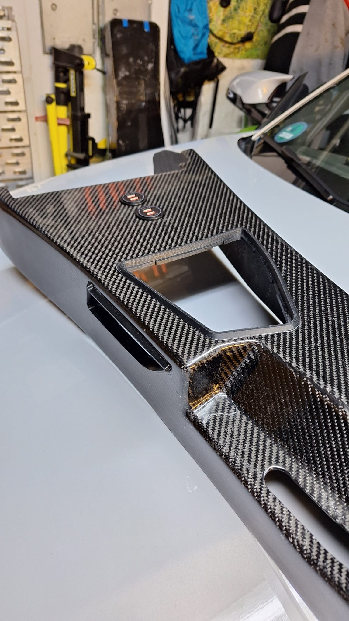 Custom carbon component fitted to vehicle interior